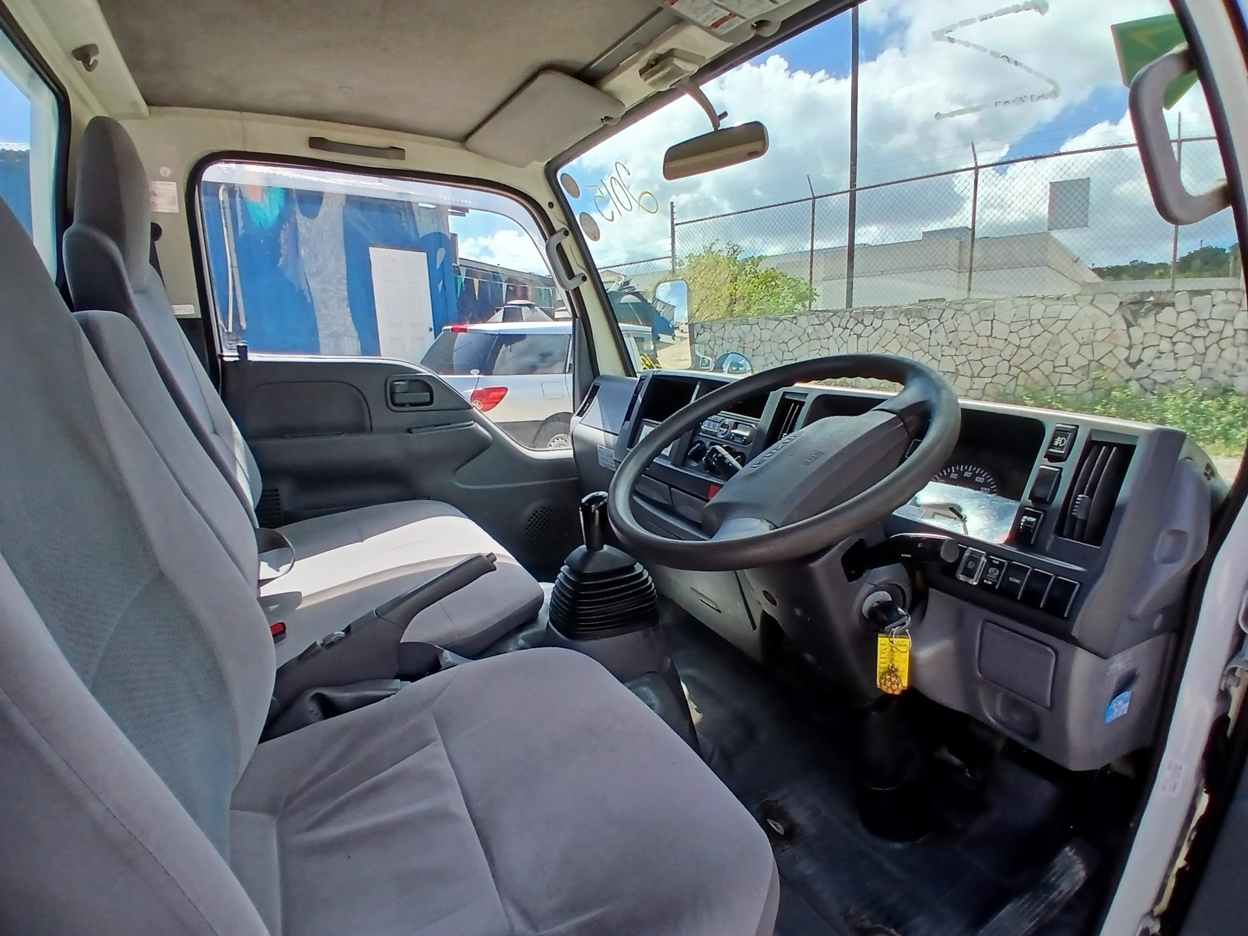 2015 Isuzu Elf Dropside Truck